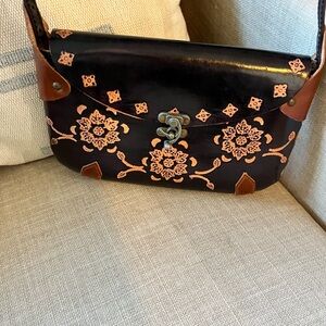 Hand made leather embossed bag